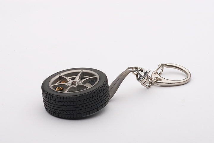 40356 NISSAN SKYLINE R34 GTR WHEEL KEYCHAIN (WITH GT-R EMBLEM HANGED)
