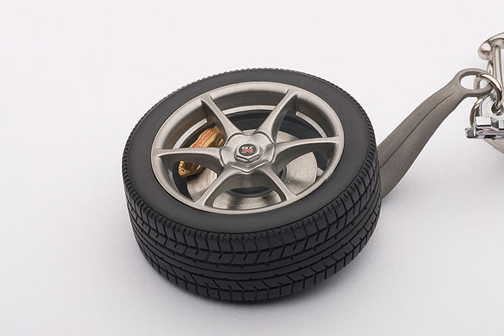 40356 NISSAN SKYLINE R34 GTR WHEEL KEYCHAIN (WITH GT-R EMBLEM HANGED)